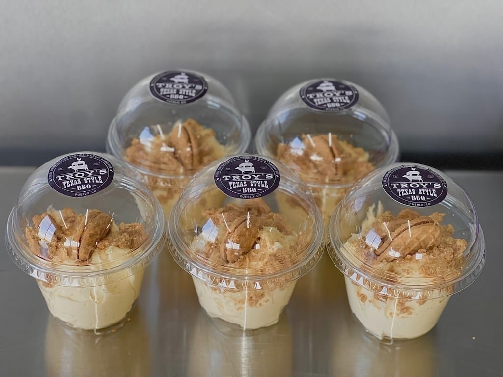 Troy's Texas BBQ branded dessert cups with peanut brittle topping