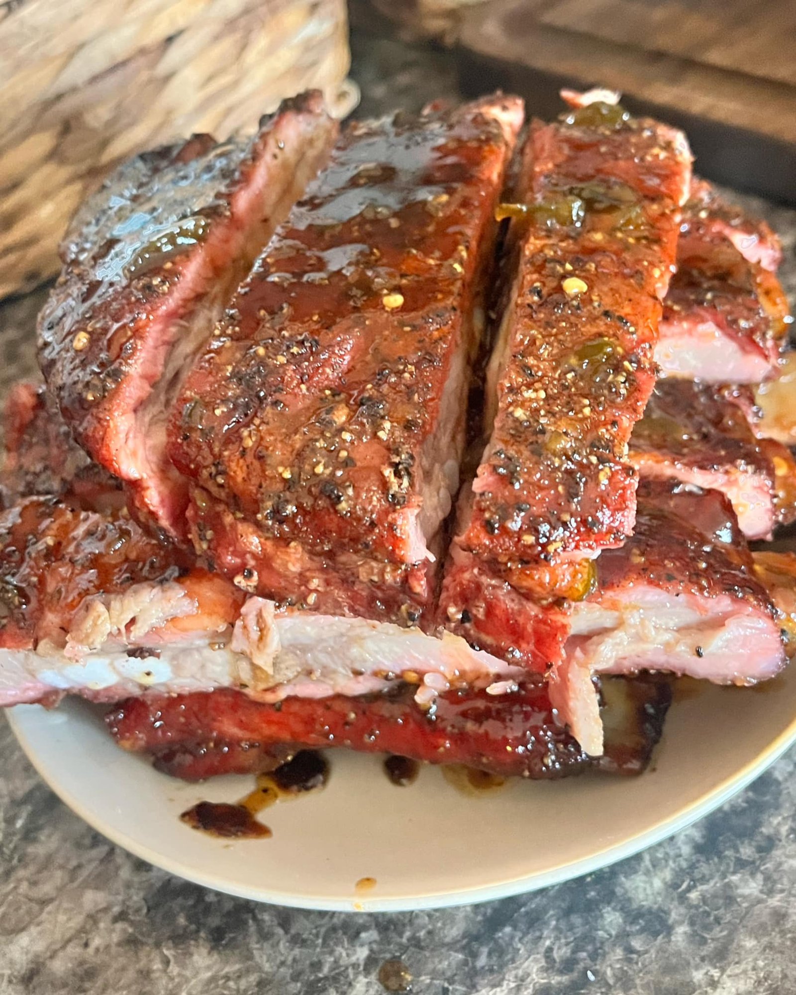 Close-up ribs with perfect smoke ring and glaze, macro detail shot